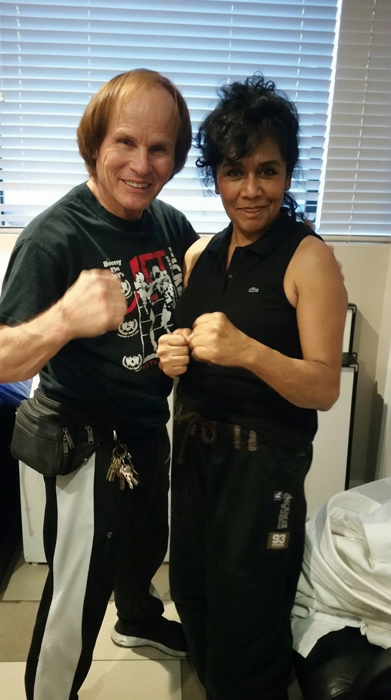 Frances Walker with martial arts legend Benny the Jet Urquidez